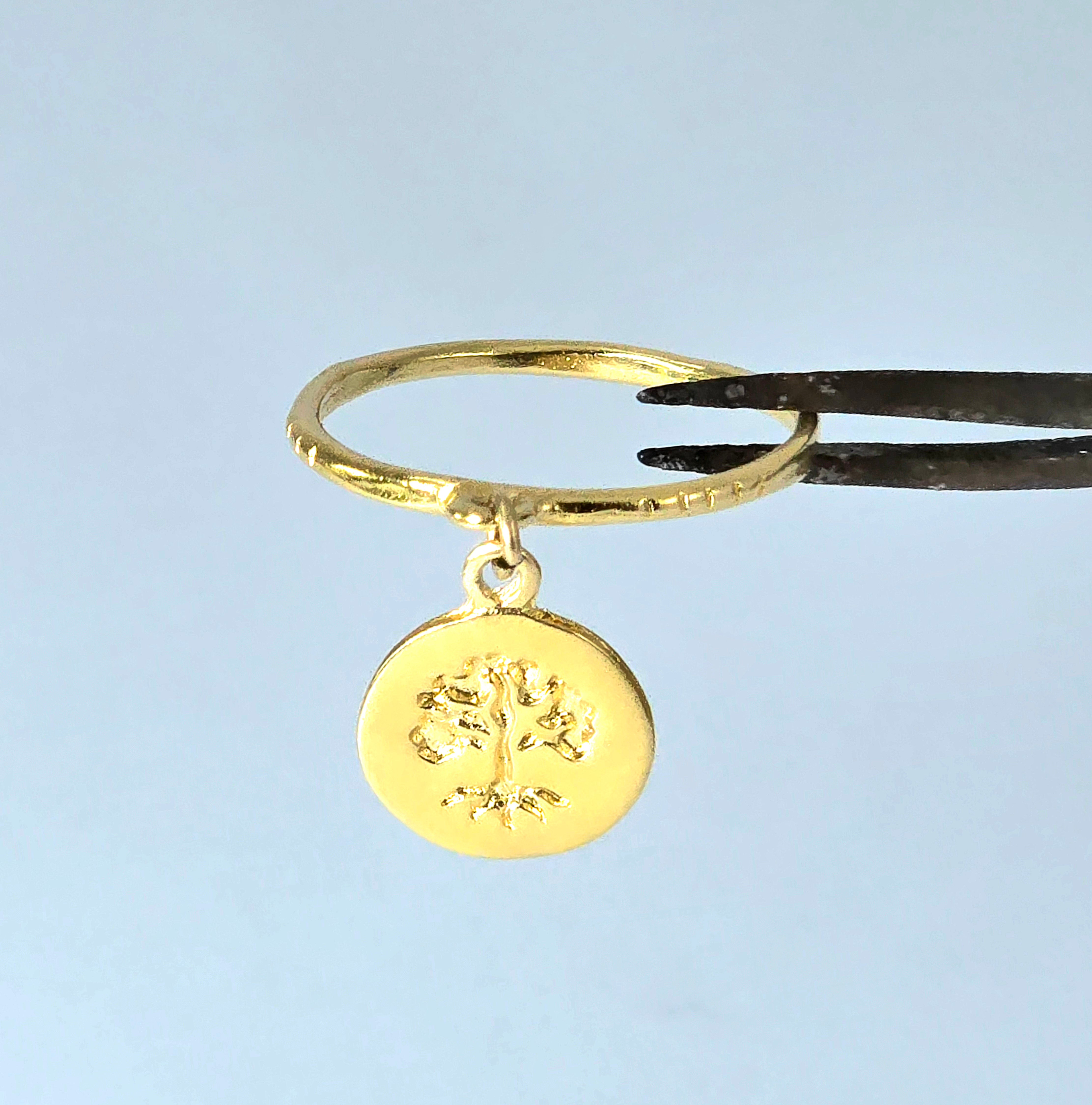 טבעת ציפוי זהב עם עץ מתנועע