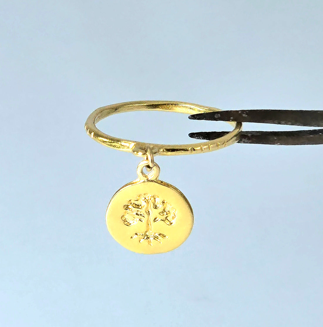 טבעת ציפוי זהב עם עץ מתנועע