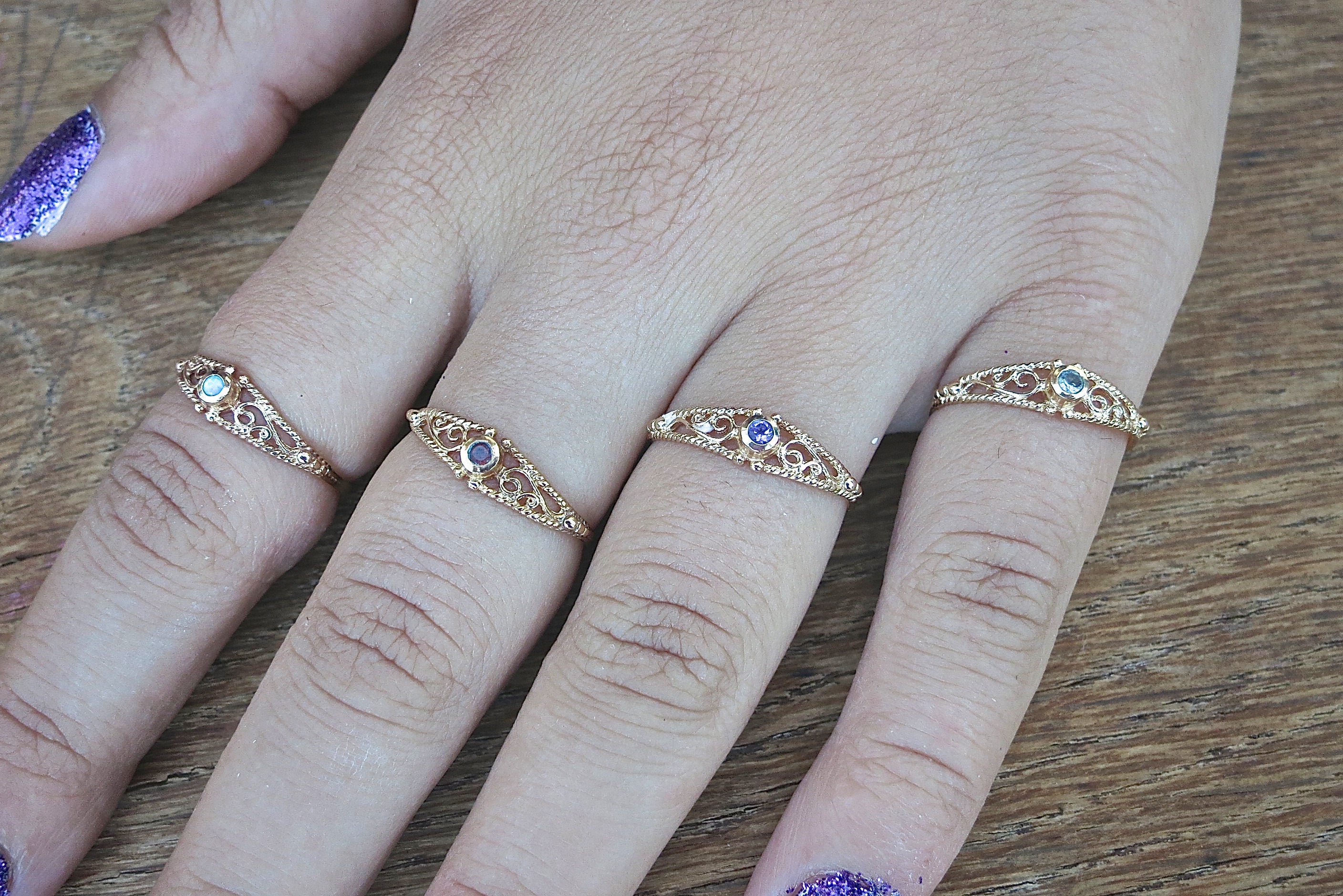 טבעת זהב 14 קראט מלאה פיליגרן דקה משובצת זהב גרנט