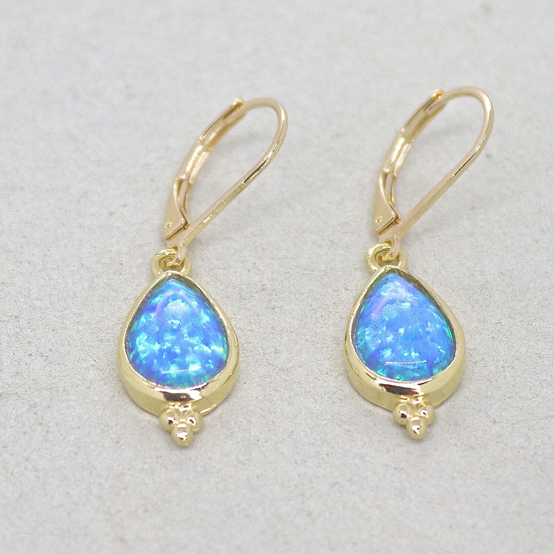 עגילי זהב אופל, עגילי זהב 14 קראט מלאים משובצים באופל כחול