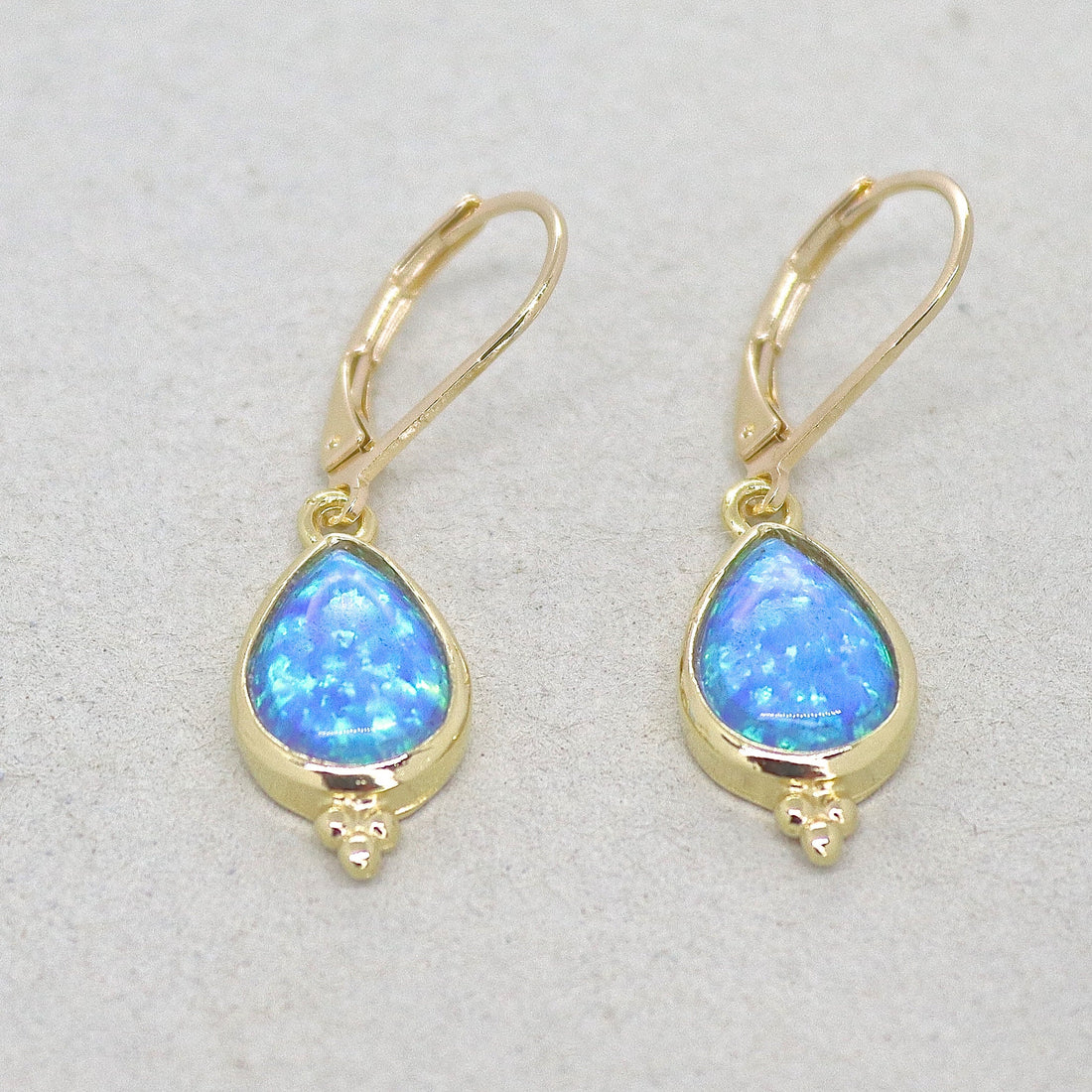 עגילי זהב אופל, עגילי זהב 14 קראט מלאים משובצים באופל כחול