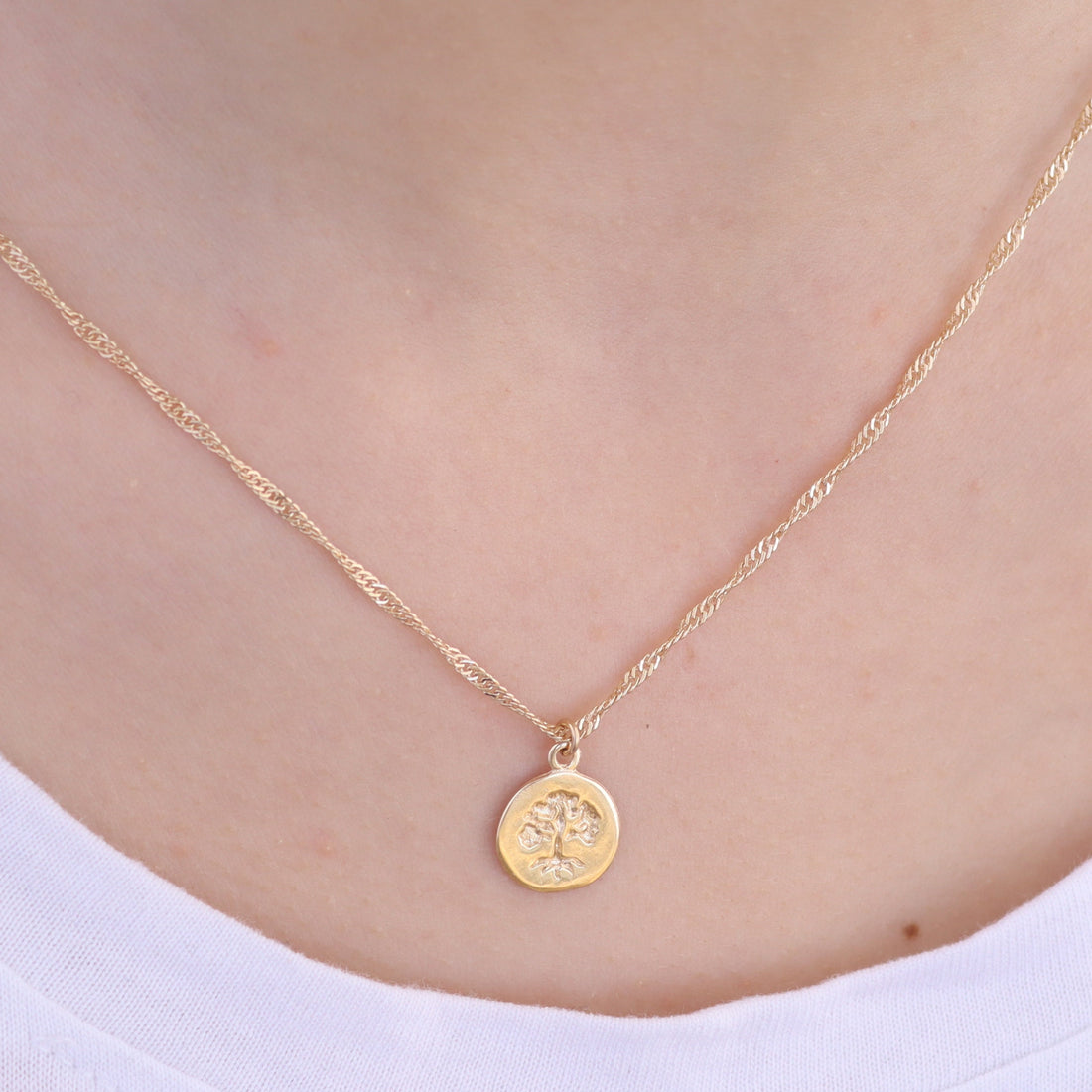 שרשרת עץ החיים, תליון עץ משפחה זעיר מזהב