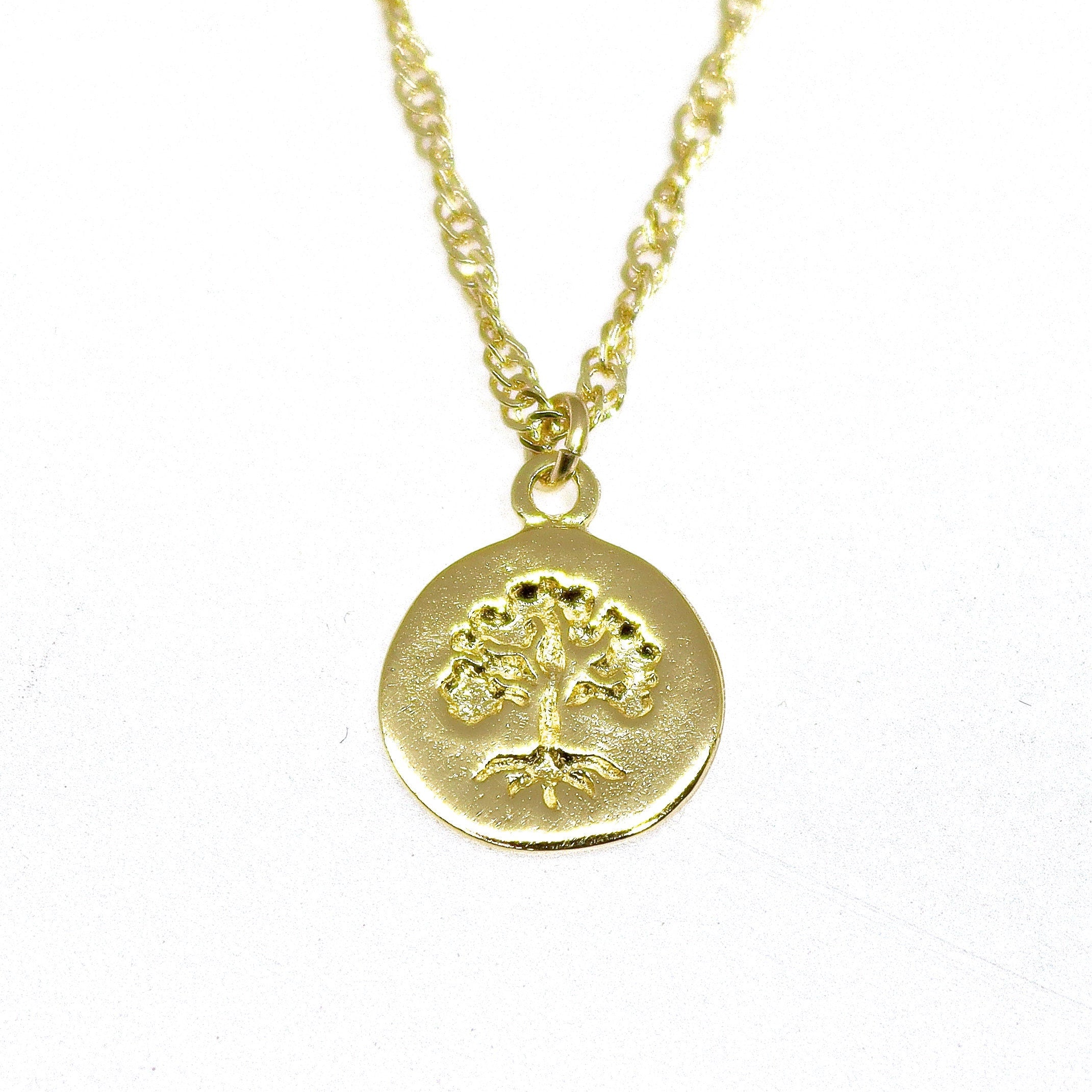 שרשרת עץ החיים, תליון עץ משפחה זעיר מזהב