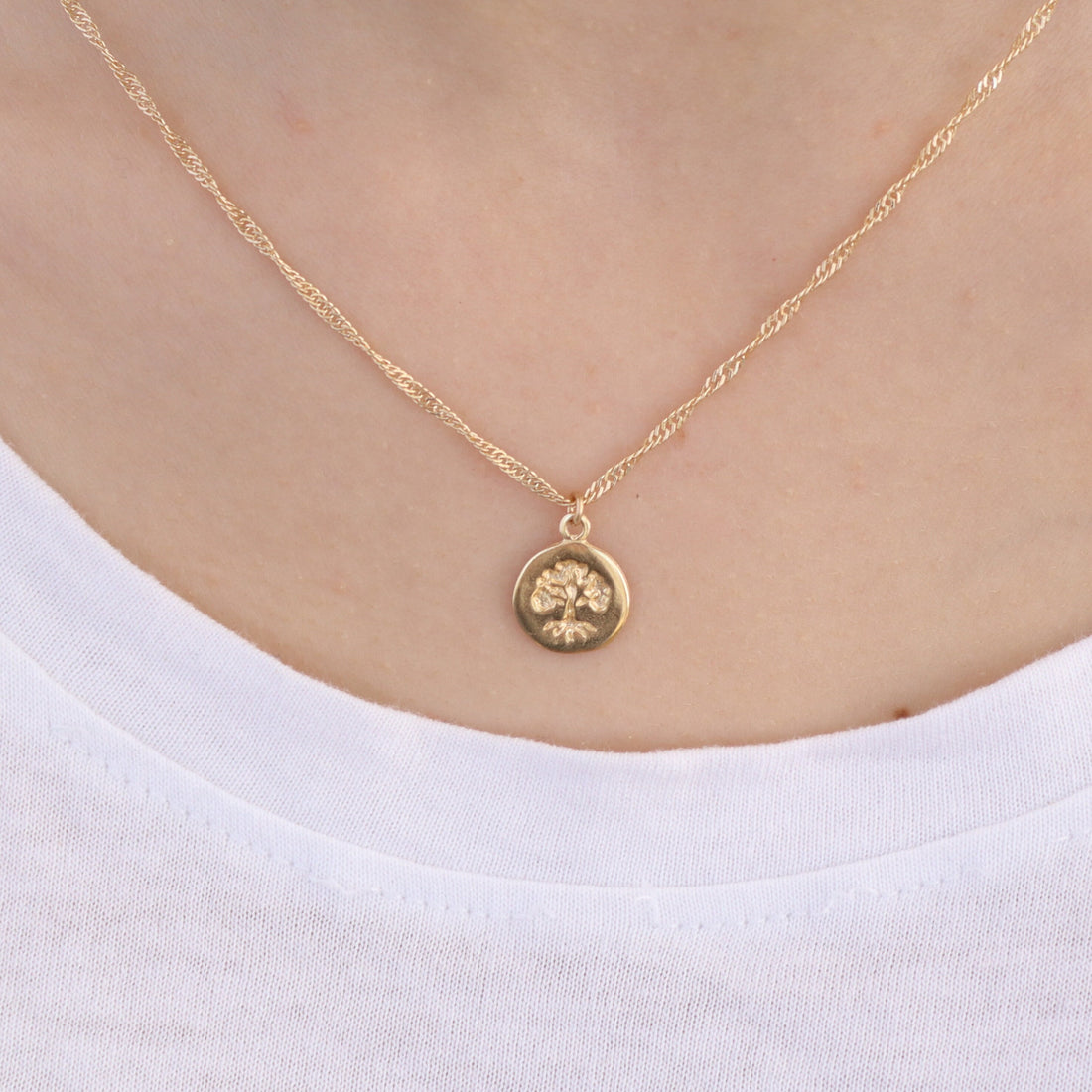 שרשרת עץ החיים, תליון עץ משפחה זעיר מזהב