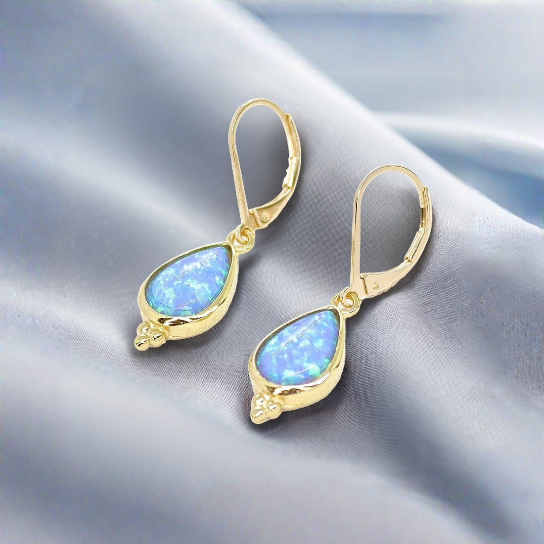 עגילי זהב אופל, עגילי זהב 14 קראט מלאים משובצים באופל כחול