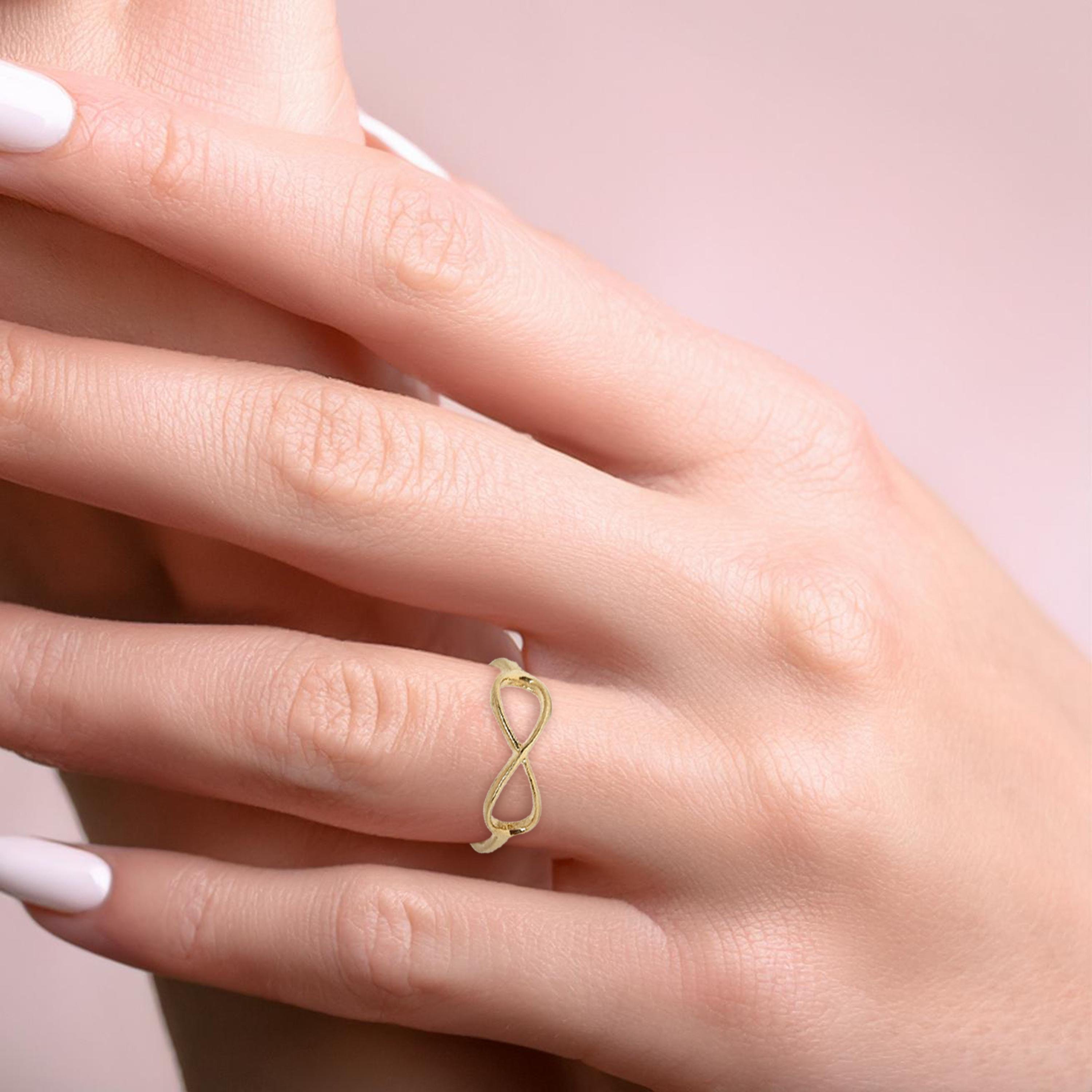 טבעת זהב מלא 14 קראט משובצת אינפיניטי