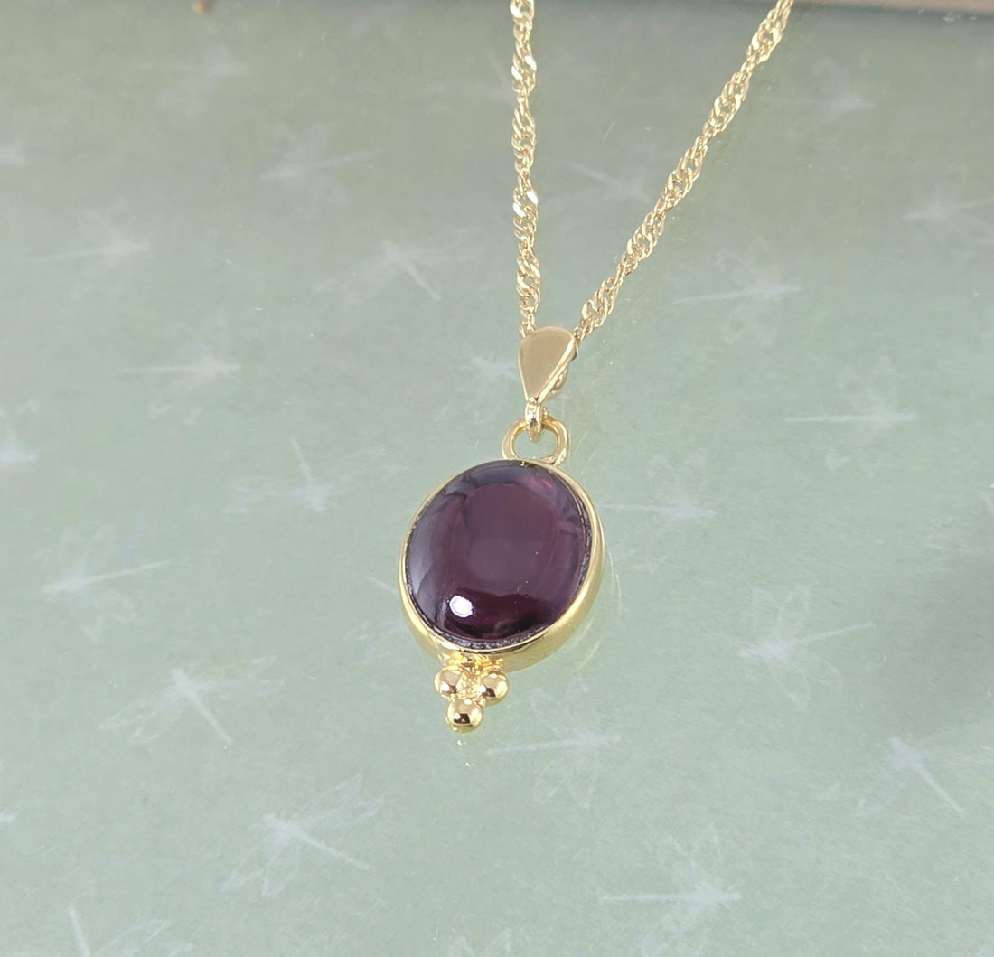 תליון שרשרת אבן חן אובלית מזהב 14 קראט משובצת גרנט