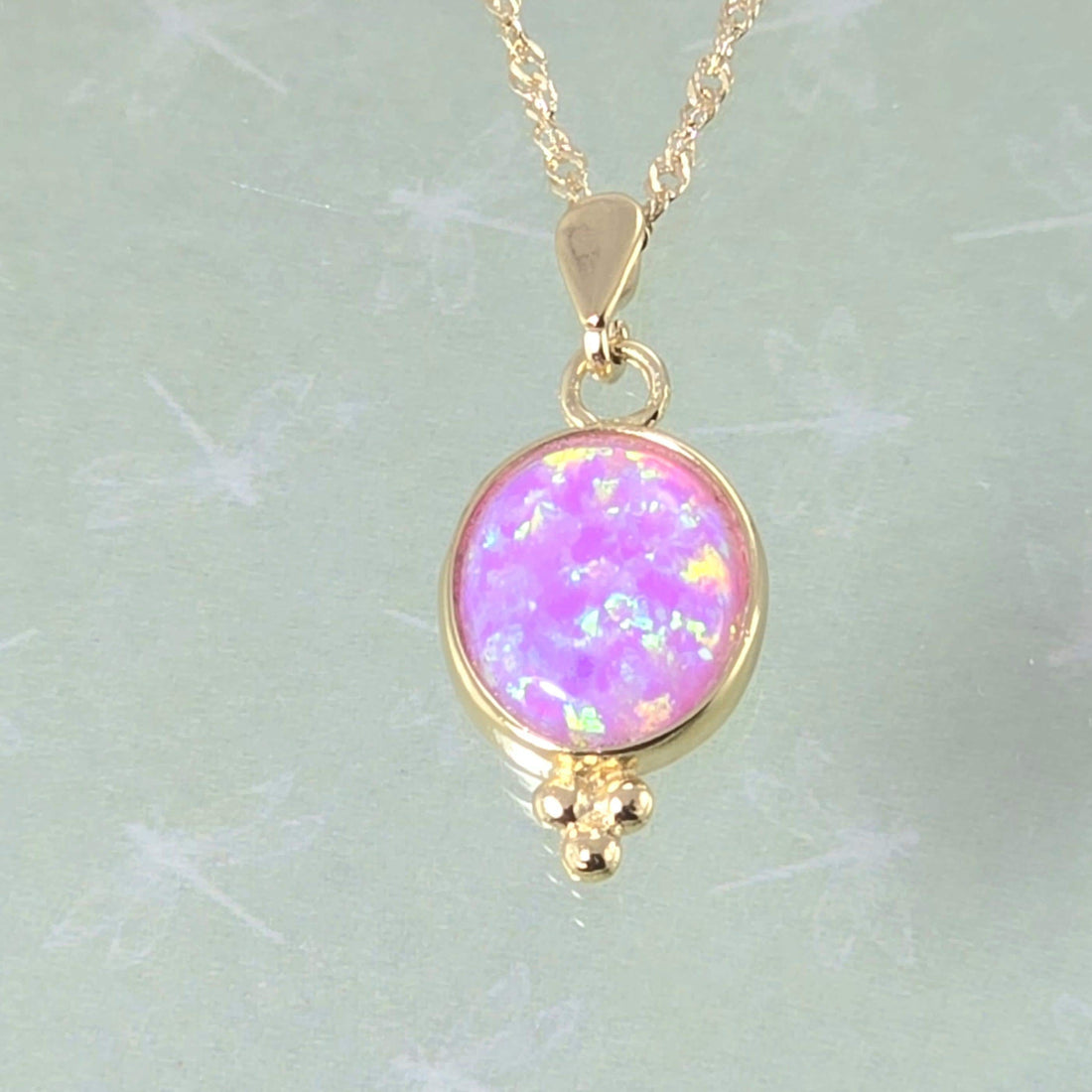 תליון שרשרת אבן חן אובלית מזהב 14 קראט משובצת גרנט