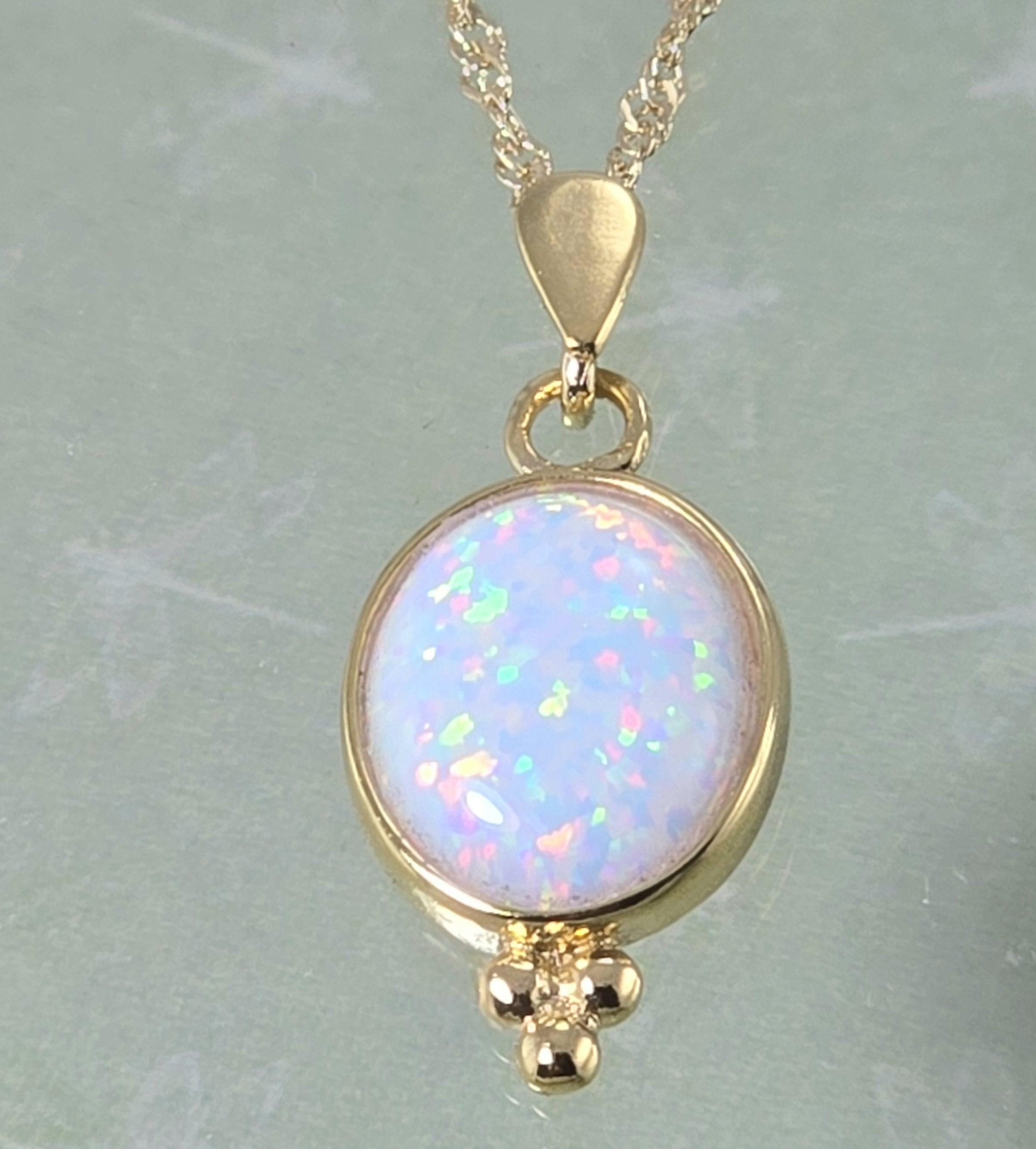 תליון שרשרת אבן חן אובלית מזהב 14 קראט משובצת גרנט