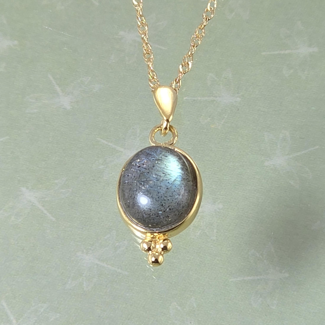 תליון שרשרת אבן חן אובלית מזהב 14 קראט משובצת גרנט