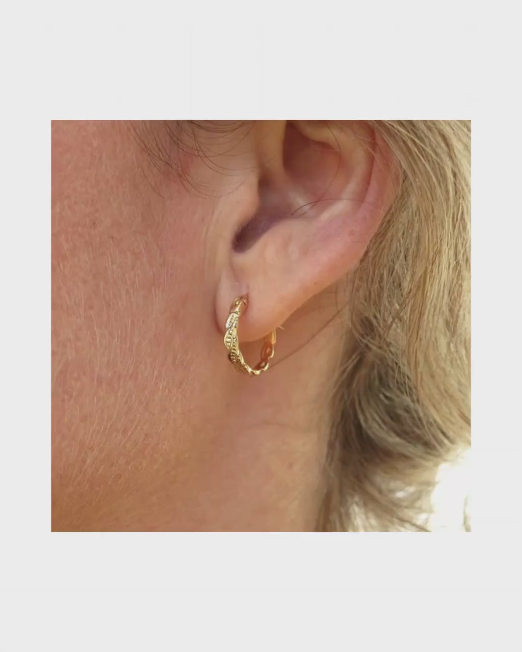 Huggie Solid 14K gold twisted hoop earrings