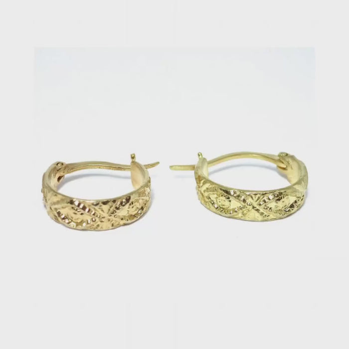 Small wide gold hoop earrings with textured