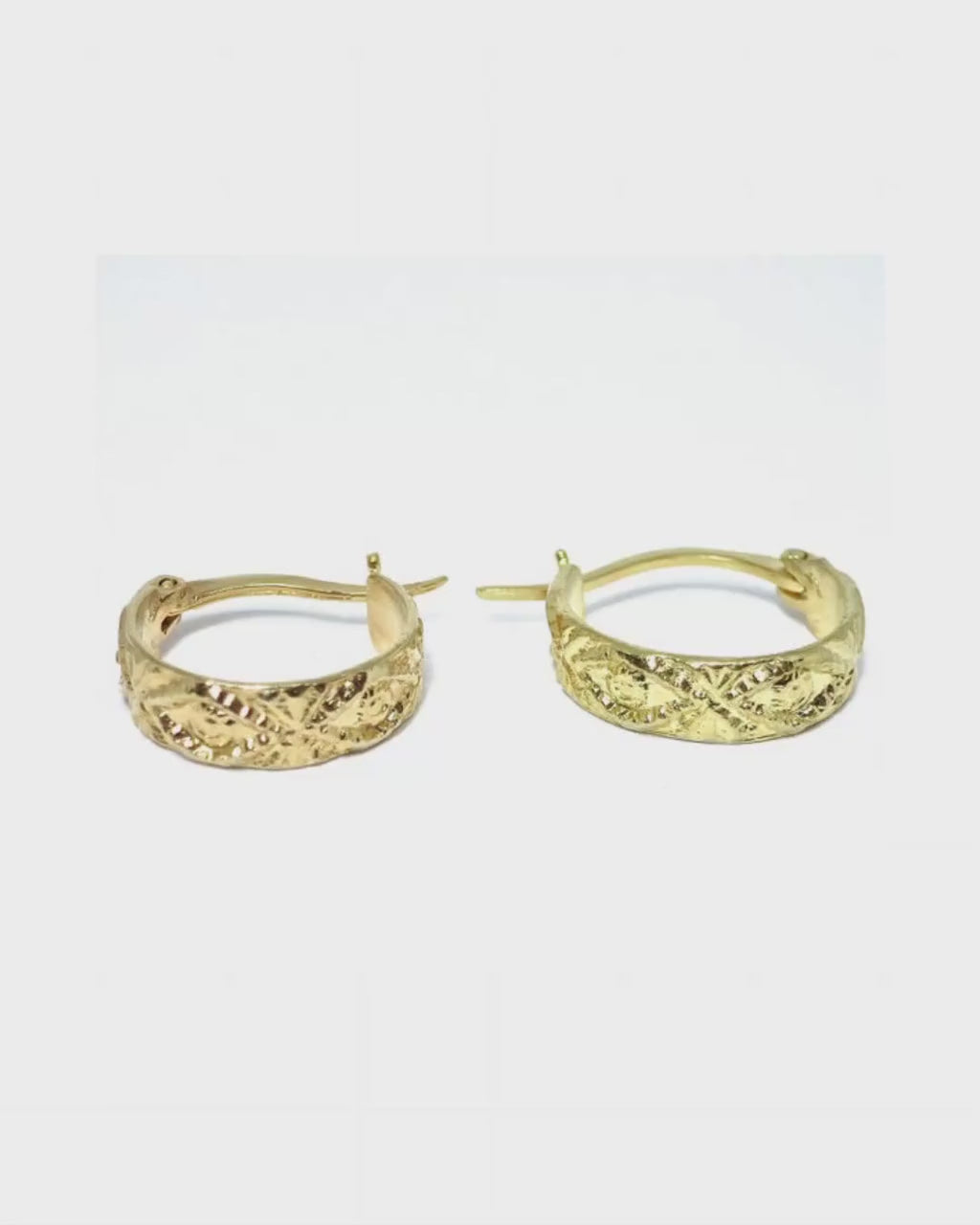 Small wide gold hoop earrings with textured